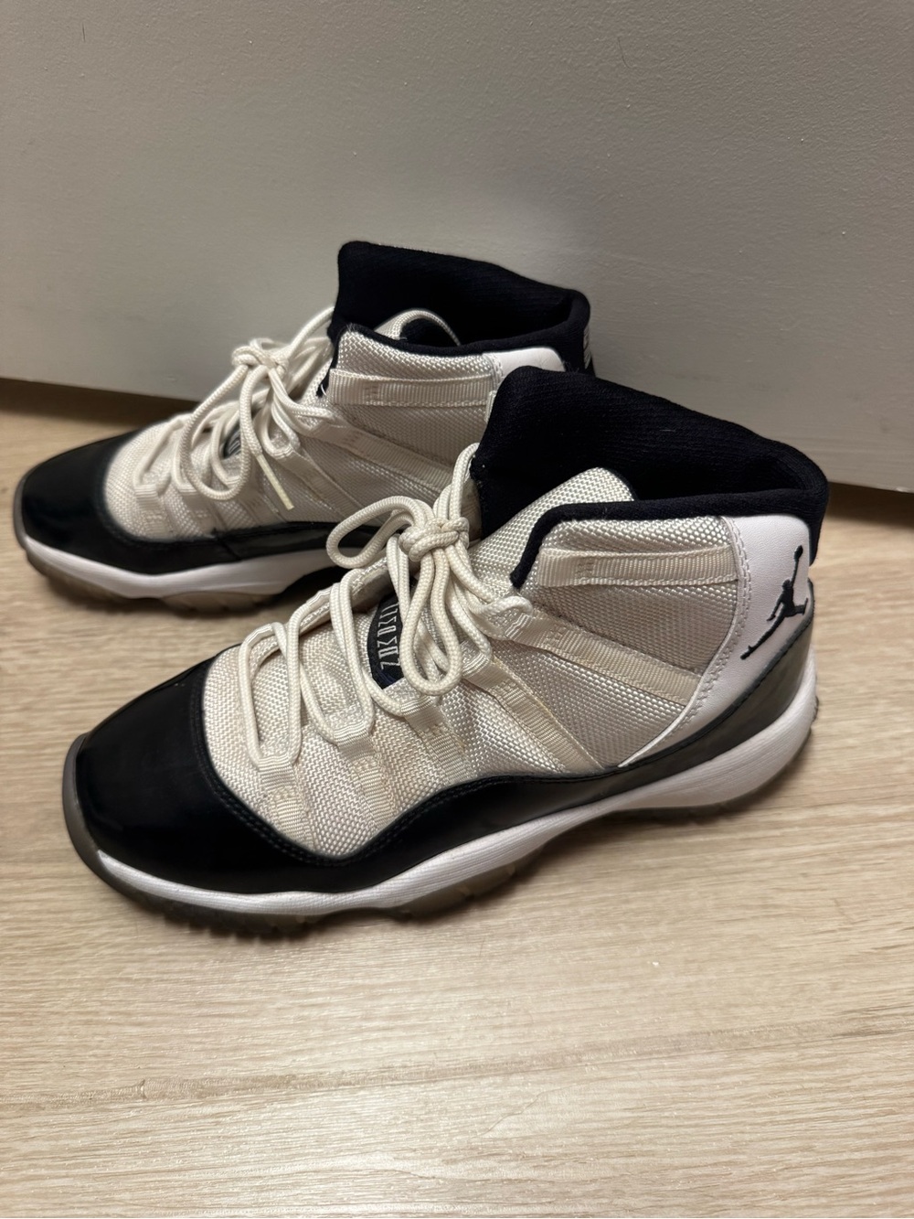 Nike Air Jordan Retro 11 Sneakers in White and Black